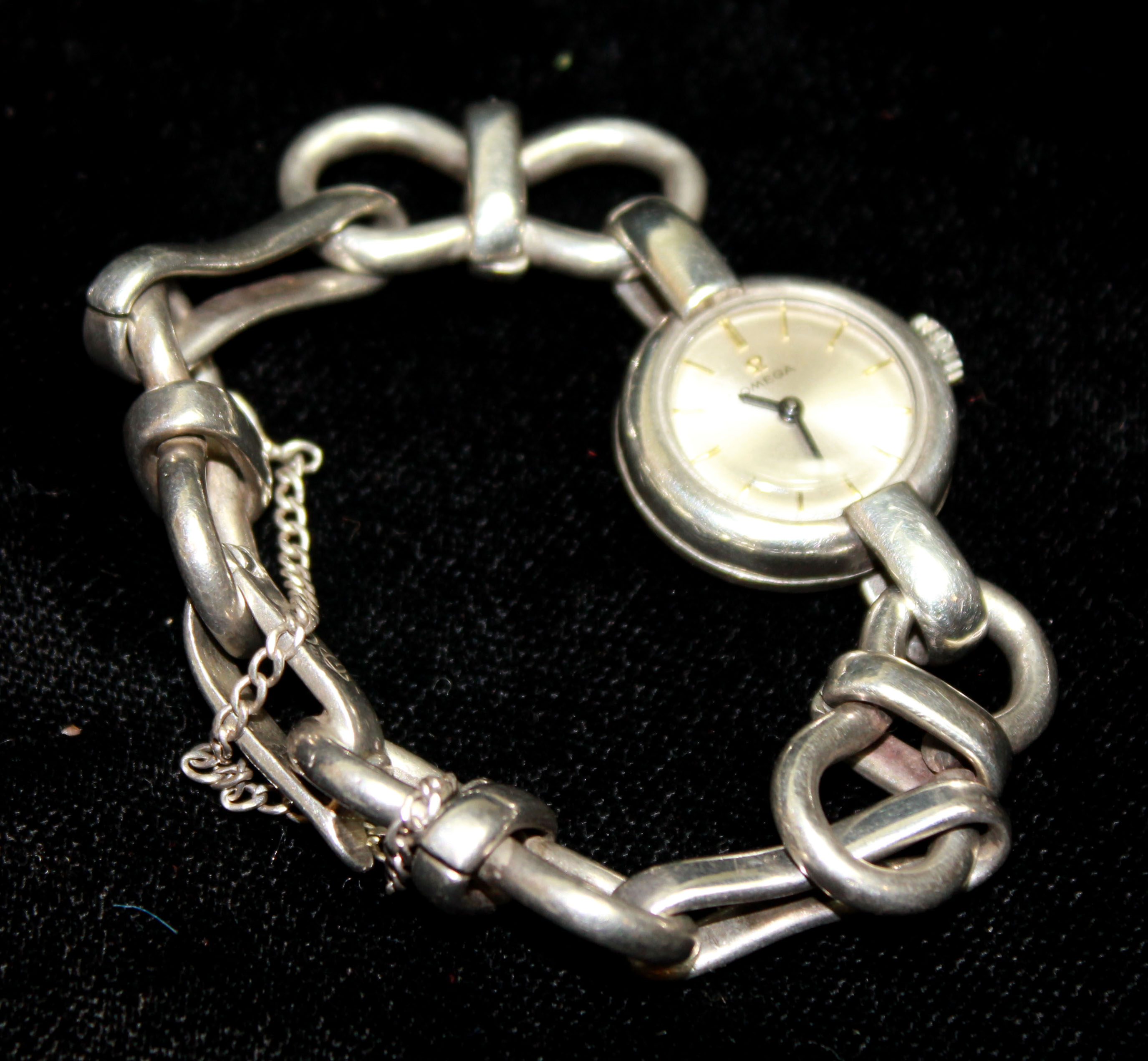A 20TH CENTURY SILVER LADIES DRESS WATCH The circular dial set with large fancy links to bracelet