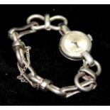 A 20TH CENTURY SILVER LADIES DRESS WATCH The circular dial set with large fancy links to bracelet