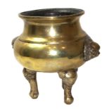 A MING BRONZE TRIPOD CENSER, CIRCA 1600 The polished body with elephant heads and feet and lion