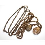 A VICTORIAN 9CT GOLD LADIES' GUARD CHAIN Box link and having two rolled gold lockets with engraved