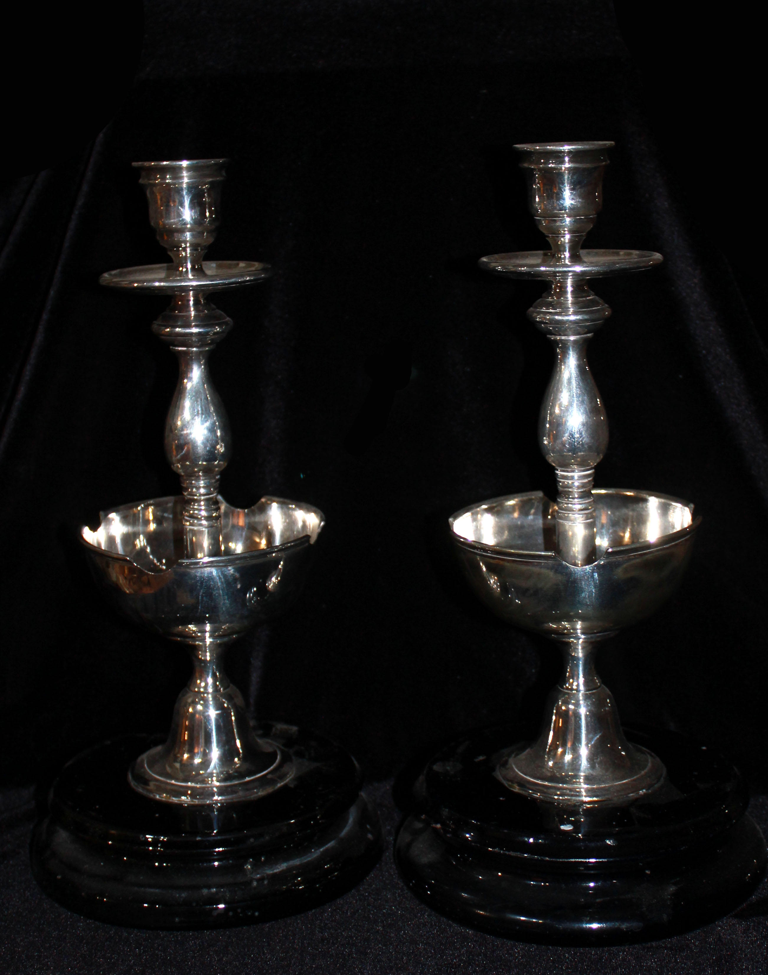 AN UNUSUAL PAIR OF 20TH CENTURY SILVER PLATED BALUSTER CANDLESTICKS WITH CIGAR HOLDER SECTIONS