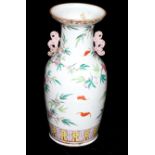 A LATE 19TH CENTURY CHINESE FAMILLE ROSE VASE Decorated with peaches. (h 45cm)