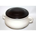 A KANGXI WHITE GLAZED CENSER OF ARCHAIC GUI FORM The plain bombé sides set with double loop handles,