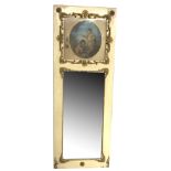 AN EARLY 20TH CENTURY FRENCH TRUMEAU MIRROR With oval picture of cherubs above a silvered plate,