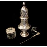 AN EARLY 20TH CENTURY SILVER PLATED SUGAR CASTER Having a spiral finial and embossed decoration,