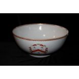 A LARGE 18TH CENTURY CHINESE ARMORIAL PORCELAIN PUNCH BOWL Hand painted with a family crest of a