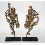 A 19TH CENTURY MACABRE PAIR OF BRONZE DANCING TIBETAN SKELETONS From the 'Tibetan Book of the Dead',