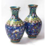 A PAIR OF SMALL 19TH CENTURY CLOISONNÉ VASES The baluster bodies decorated with bats on deep blue