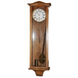 A 19TH CENTURY BLEACHED WALNUT CASED VIENNA REGULATOR CLOCK With brass weight and repaired pendulum.