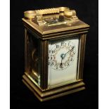 A 19TH CENTURY GILT BRASS MINIATURE CARRIAGE CLOCK The rectangular shape with four bevelled glass