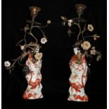 A PAIR OF 19TH CENTURY ORMOLU WIRE LIGHTS Decorated with porcelain flowers. (w 20cm)