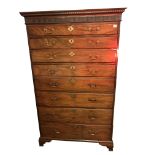 AN 18TH CENTURY SOLID MAHOGANY TALLBOY SECRÈTAIRE CHEST The dentil cornice above six graduating