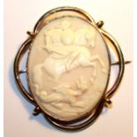 A VICTORIAN PINCHBECK OVAL SHELL CAMEO BROOCH Carved with King George slaying a crouching dragon. (