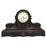 A 19TH CENTURY FRENCH SLATE AND ROUGE MARBLE ARCHITECTURAL STYE MANTEL CLOCK With dome top, fluted