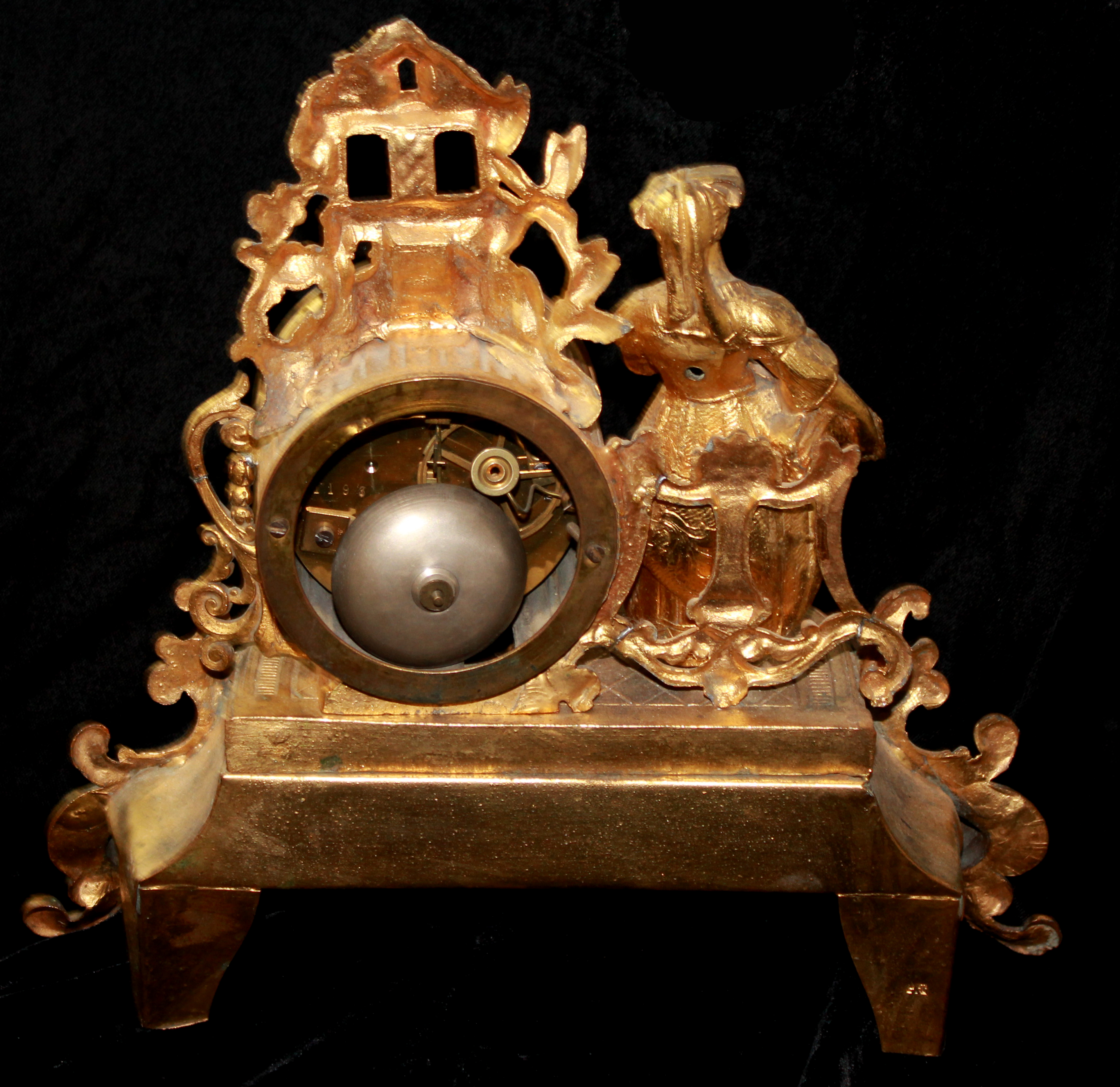 A 19TH CENTURY FRENCH SPELTER AND PORCELAIN FIGURAL MANTLE CLOCK Cast with a maiden holding a - Image 2 of 2