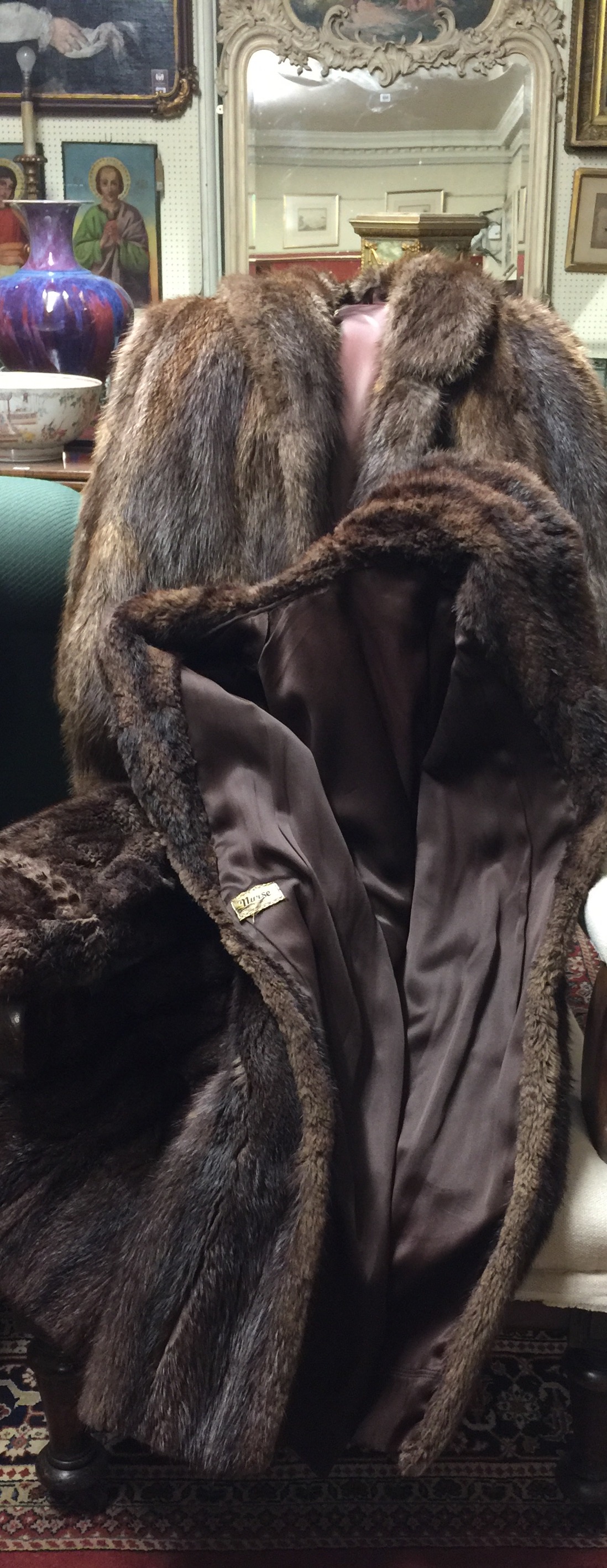 A VINTAGE MINK COAT Along with another.