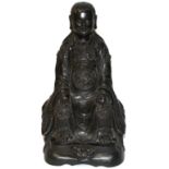 A FINE MING BRONZE SEATED FIGURE OF ZHENWU, GUARDIAN OF THE NORTHERN QUADRANT, CIRCA 1600 The finely