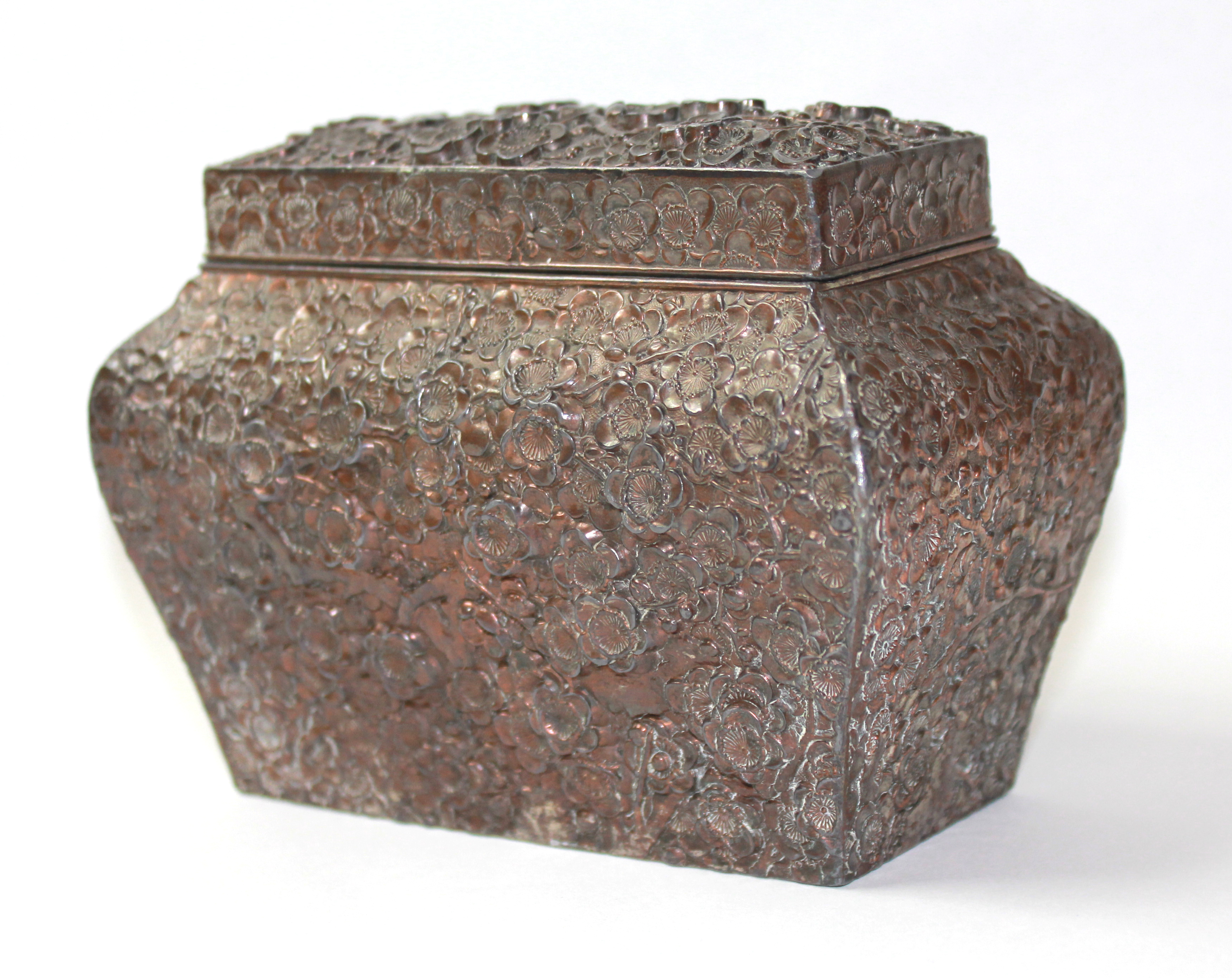 AN EARLY 20TH CENTURY CHINESE SILVER PLATED RECTANGULAR TEA CADDY With embossed decoration of