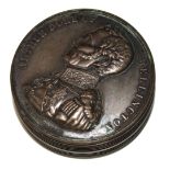 DUKE OF WELLINGTON, A 19TH CENTURY BRONZE CIRCULAR SNUFF BOX With an embossed portrait to front,