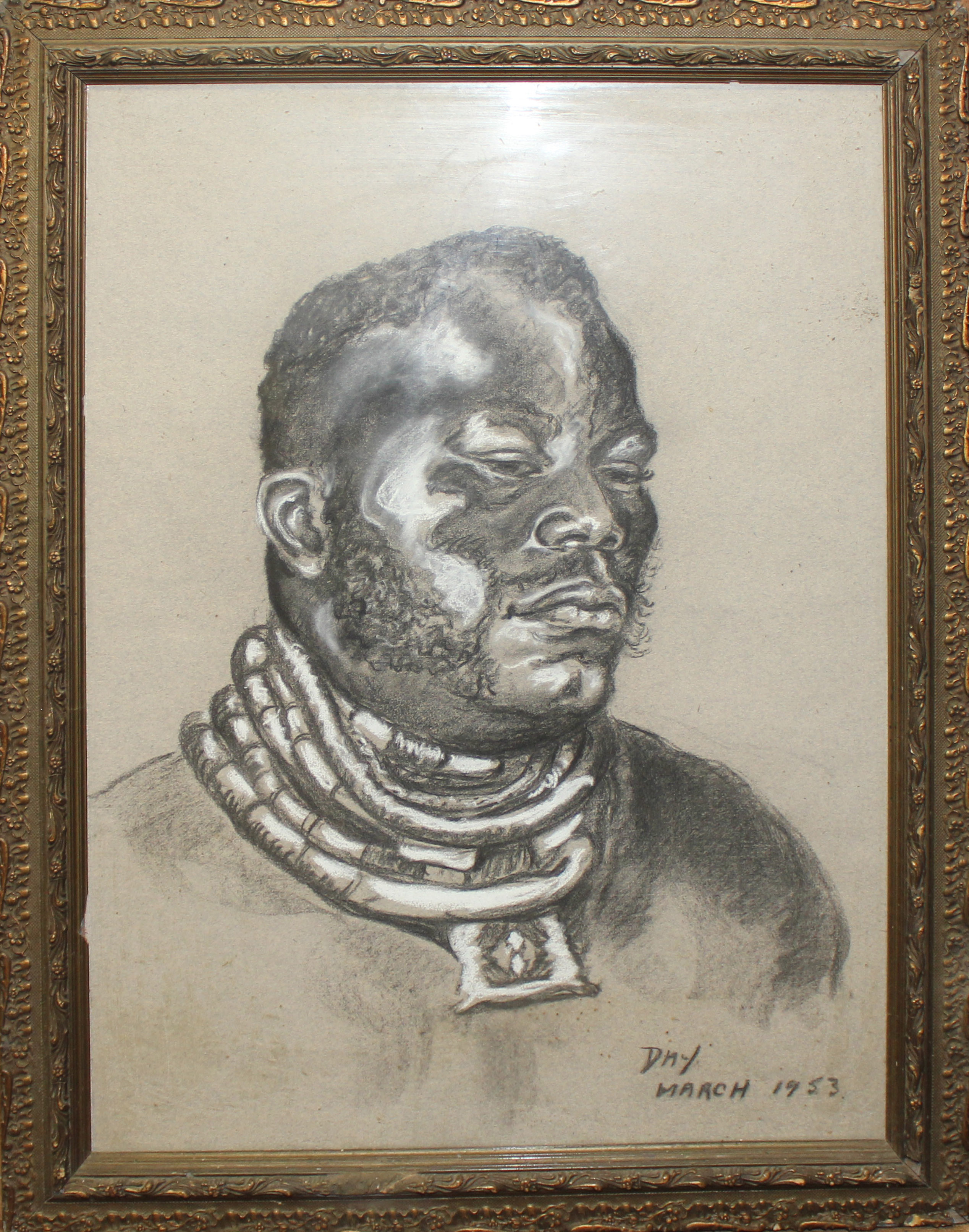 A 20TH CENTURY PASTEL AND CHALK Of an African Tribesman, signed lower right 'Day March 1953', framed