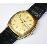 OMEGA, A VINTAGE GOLD PLATED GENT'S WRISTWATCH The square gold tone dial with calendar date
