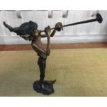 A LARGE BRONZE STATUE A PIXIE PLAYING A TRUMPET. (105cm)