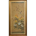 A 20TH CENTURY CHINESE SILK PAINTING The single bird in a floral garden, signed to right, framed and