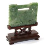 A RECTANGULAR SPINACH GREEN JADE PLAQUE, CIRCA 1800 One side decorated with a four character