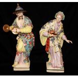A PAIR OF 20TH CENTURY GERMAN PORCELAIN FIGURINES Oriental style characters, a Mandarin playing