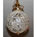 TWO 20TH CENTURY CUT GLASS AND BRASS PENDANT LIGHT FITTINGS Spherical with deep cuts of floral