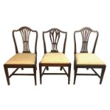 THREE 19TH CENTURY MAHOGANY DINING CHAIRS With shaped rail and pierced splat backs over