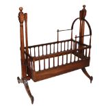 A GOOD EARLY 19TH CENTURY MAHOGANY AND EBONY INLAID SWINGING CRIB. (h 130cm x l 113cm x d 63cm)