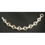 TIFFANY & CO., AN 18CT YELLOW GOLD AND SILVER BRACELET Stamped and hallmarked.