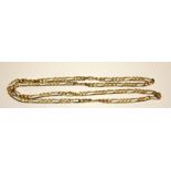 A VINTAGE 18CT GOLD FIGARO LINK BRACELET Having three link segments interspersed with a single