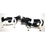 A BESWICK PORCELAIN FRESIAN BULL, 'CH CODDINTON HILT BAR' Finished in a black and white glaze, model