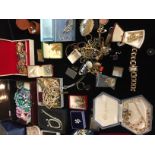 A COLLECTION OF COSTUME JEWELLERY To include a selection of brooches, necklaces, watches,