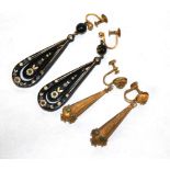 A PAIR OF VICTORIAN TORTOISHELL PIQUE DROP EARRINGS Pear cut with inlaid gilt floral decoration,