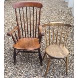 A VICTORIAN STICK BACK ARMCHAIR Plus one other.