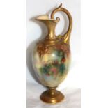 AN EARLY 20TH CENTURY ROYAL WORCESTER PORCELAIN EWER Hand painted with peacocks perched in an exotic