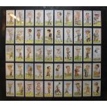 A SET OF FIFTY VINTAGE GOLFING CIGARETTE CARDS Issued by Churchman's Cigarette cards titled'
