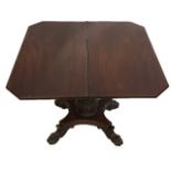 A REGENCY MAHOGANY FOLD OVER TEA TABLE Raised on a turned and carved acanthus leaf pedestal,