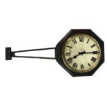 A 20TH CENTURY OCTAGONAL PAINTED BRASS GPO DOUBLE SIDED WALL CLOCK AND BRACKET. (case d 38cm x