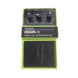 A NOBELS ODR-1 NATURAL OVERDRIVE PEDAL With drive, spectrum and level dials, finished in green.