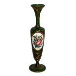 A 19TH CENTURY GREEN BOHEMIAN GLASS CAMEO VASE Slender form with flared rim and floral white glass