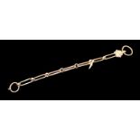 A 19TH CENTURY YELLOW METAL ALBERT CHAIN Dog link chain interspersed with reeded spacers leading