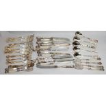 A SET OF SIX 19TH CENTURY SILVER PLATE AND MOTHER OF PEARL FRUIT KNIVES AND FORKS Having coronet
