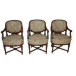 A SET OF THREE 19TH CENTURY CARVED MAHOGANY ARMCHAIRS With tapestry upholstered sprung seats and