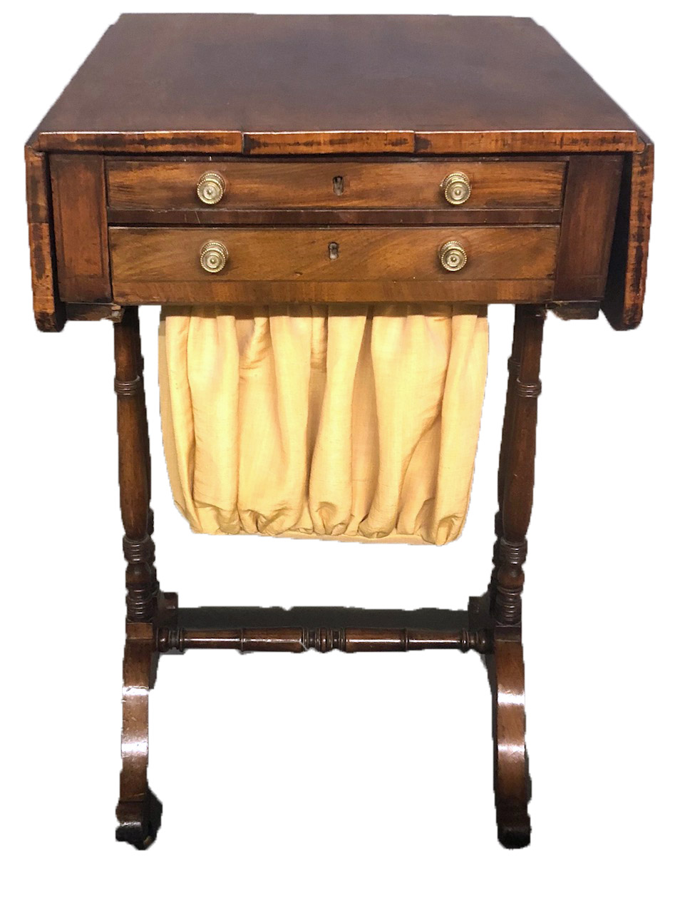A 19TH CENTURY MAHOGANY WORK/SIDE TABLE With drop leaves above real and false drawers and fabric