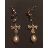 A PAIR OF WHITE GOLD AND DIAMOND ENCRUSTED PEARL DROP EARRINGS. (42cm)