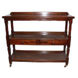 A 19TH CENTURY MAHOGANY BUFFET With a galleried back and arrangement of shelves and drawers,
